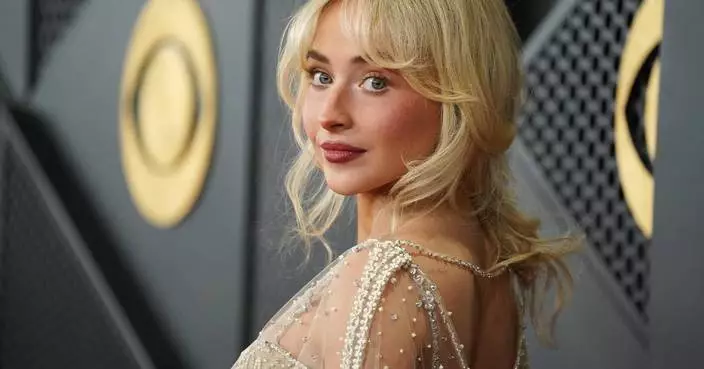 See photos of music's biggest stars arriving for the Grammy Awards