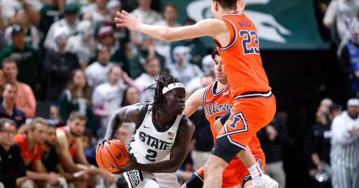 Jeremy Fears' 26 points and 15 assists help No. 10 Michigan State beat No. 5 Illinois 85-82 in OT