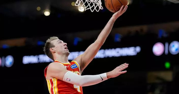 Lakers acquire 3-point shooter Kennard from busy Hawks for point guard Vincent, AP source says