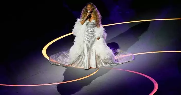 Mariah Carey's Olympic act prompts questions about possible lip-syncing and a curious teleprompter