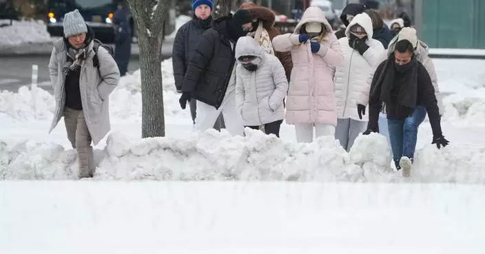 Blizzard warnings send East Coast scrambling to prepare for heavy snow and strong winds