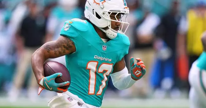 Broncos get star wide receiver Jaylen Waddle from Dolphins in a blockbuster trade, AP source says