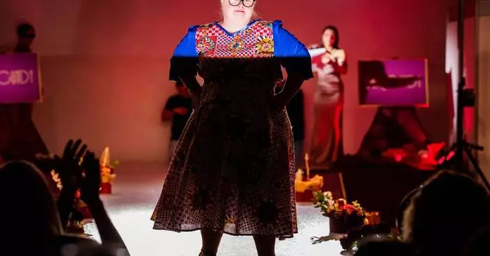 Models with Down syndrome walk a Bucharest runway for World Down Syndrome Day, in photos