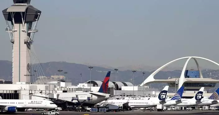 United flight returns to LA airport for an evacuation after a reported fire