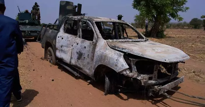 Militants in northern Nigeria kill 10 security forces and 1 resident, officials say