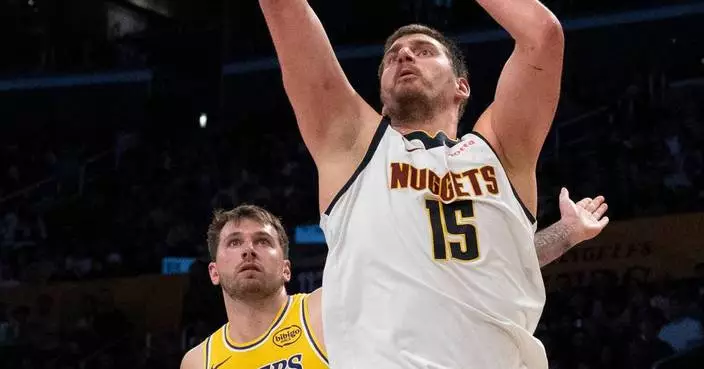 Luka Doncic hits game-winner with 0.5 seconds remaining in overtime as Lakers beat Nuggets 127-125