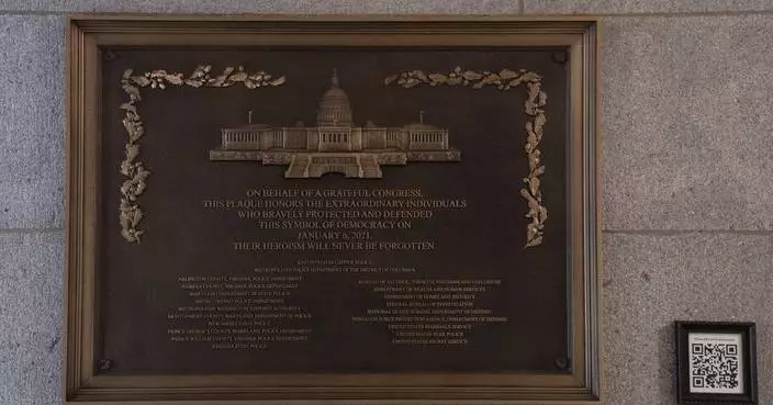 Jan. 6 plaque honoring police officers is installed at the Capitol after a 3-year delay
