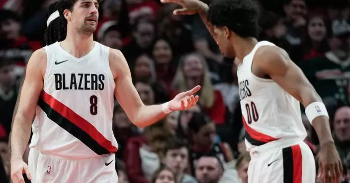 Henderson has 23 and the Trail Blazers rout the fading Bucks 130-99