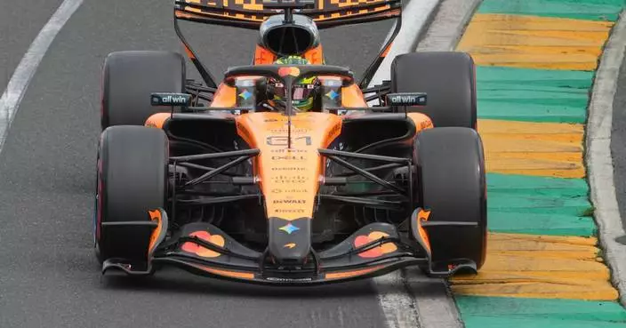 McLaren's Oscar Piastri crashes out on the way to the grid for Formula 1's Australian GP