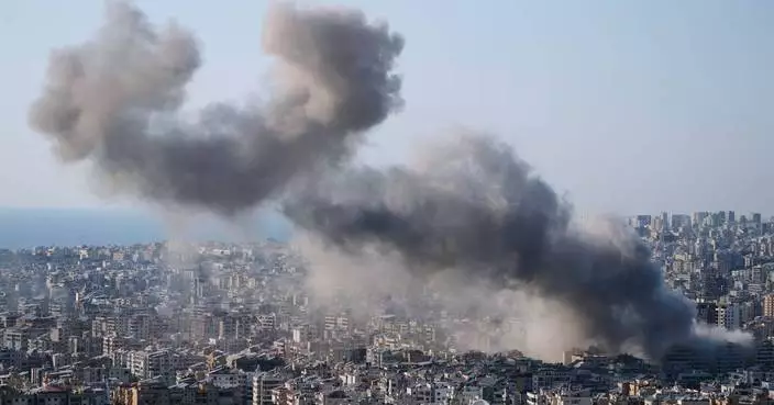 The Latest: Iran fires at Gulf states as Australia grants asylum to women on Iranian soccer team