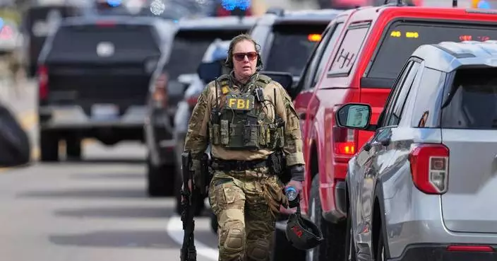 Photos show response after attack at suburban Detroit synagogue