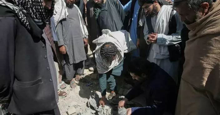 Afghanistan says Pakistani mortars killed 2 children as fighting stretches into third week
