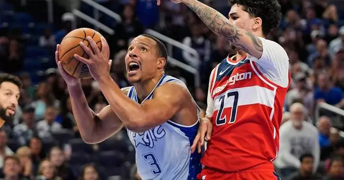 Suggs helps Magic overcome Coulibaly and the Wizards in OT for their 6th straight win