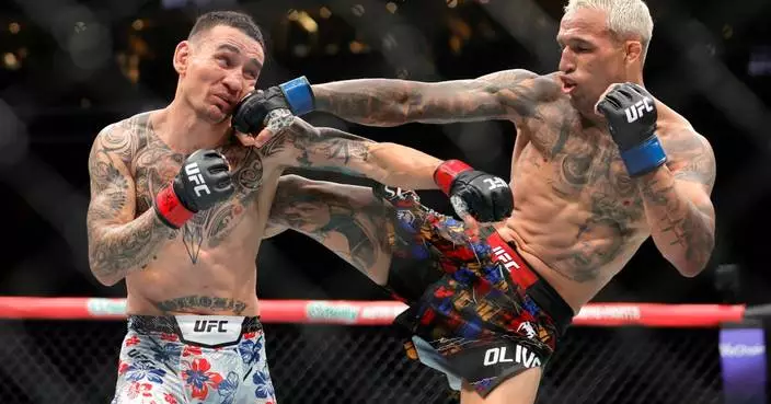 Charles Oliveira takes BMF title from Max Holloway at UFC 326, nearly 11 years after first meeting