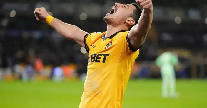 Mohamed Salah scores but Liverpool stunned by last-place Wolves 2-1