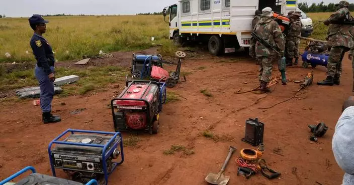 South African soldiers dismantle illegal mining operations near Johannesburg as miners flee