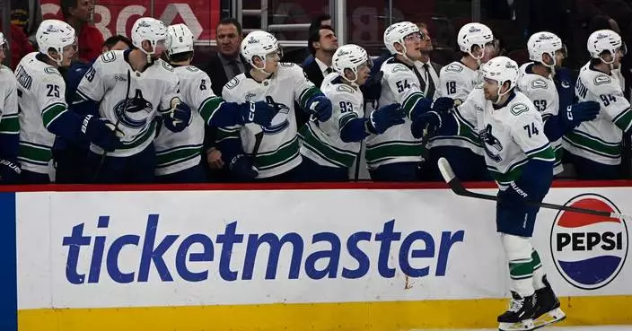 NHL-worst Canucks beat the Blackhawks 6-3 to end a 7-game skid