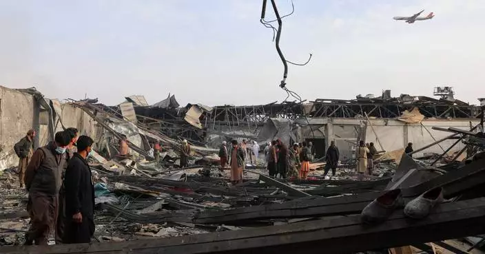 Rescue crews dig bodies out of the ruins of a Kabul hospital hit in an airstrike blamed on Pakistan