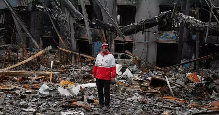 The Latest: Iranian-backed Houthi rebels claim responsibility for missile attack on Israel