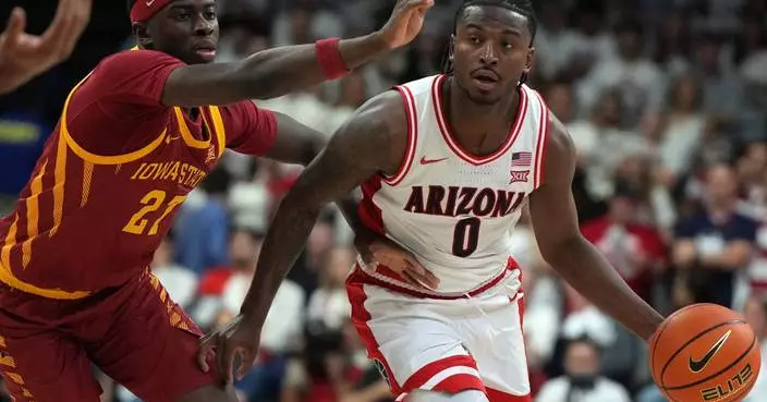 Arizona guard Jaden Bradley and coach Tommy Lloyd pick up Big 12 awards