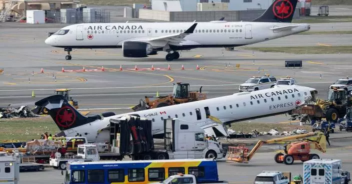 Mangled plane in LaGuardia crash is towed from runway as most injured passengers leave hospital