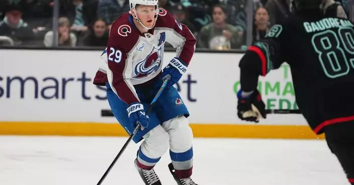 Colorado Avalanche forward Nathan MacKinnon has game misconduct rescinded by NHL, AP source says
