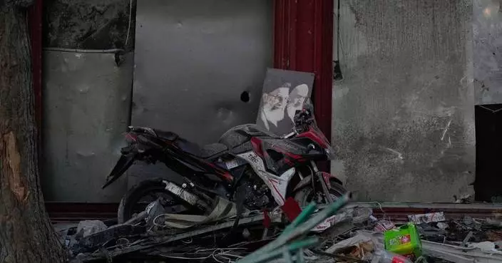 Photos from inside Iran as strikes boom across the capital, Tehran, for a third day