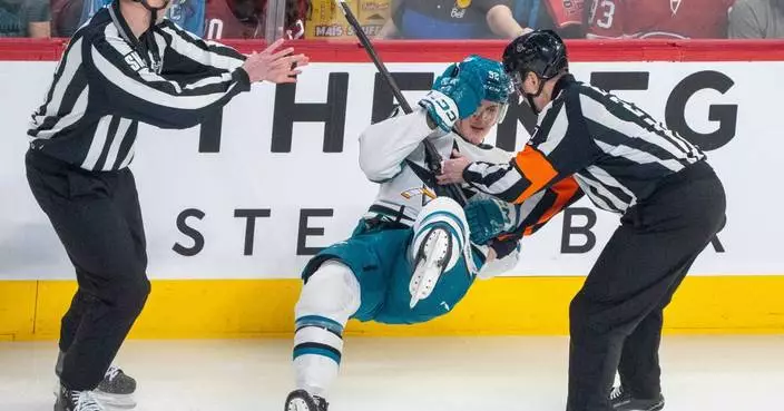 Sharks rookie Chernyshov exits after a big hit less than 30 seconds in against Montreal