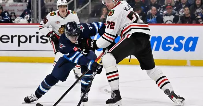 Scheifele scores in overtime as the Jets beat the Blackhawks 3-2