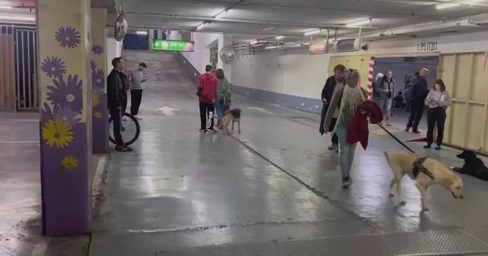 Tel Aviv residents take shelter as sirens sound repeatedly across city