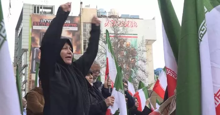 Iranians rally in Tehran to express support for government
