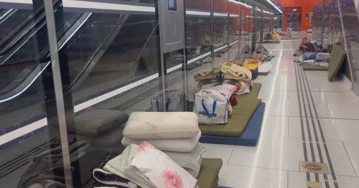 Tel Aviv residents shelter in underground stations amid missile sirens