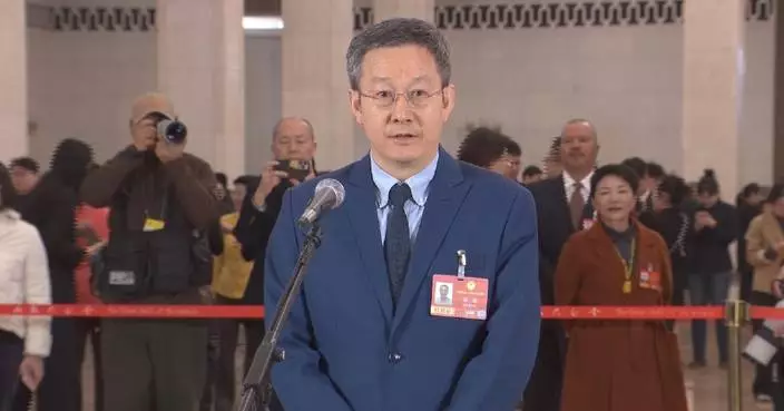 Professor advocates science popularization to inspire future innovators at CPPCC session