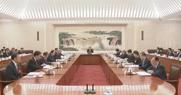 China's national legislature holds 2nd presidium meeting at annual session