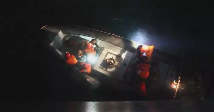 PLA Navy frigate Yangzhou saves 10 fishermen from sinking boat