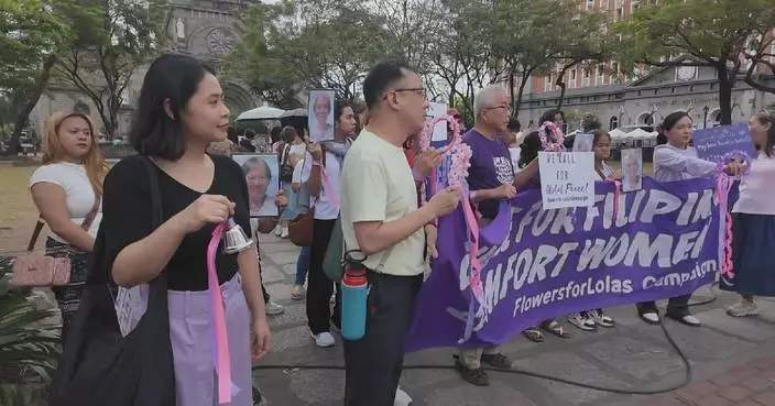 Filipinos march in Manila to honor wartime victims, denounce Middle East conflict