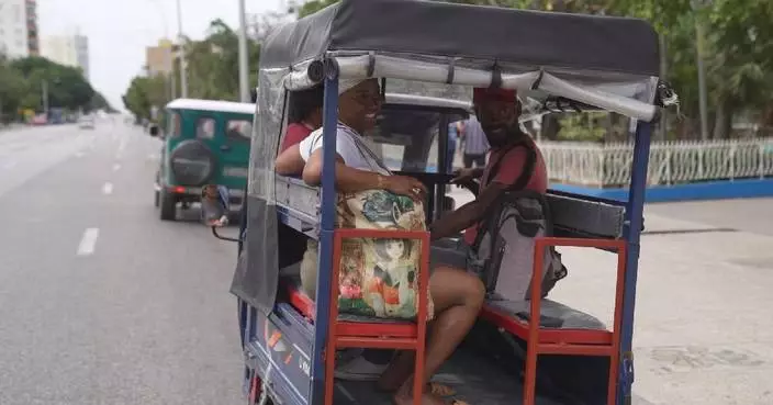 Fuel crunch pushes up demand for electric tricycle service in Cuba