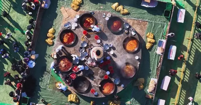 Folk culture week opens in Inner Mongolia, draws visitors to Yellow River feast