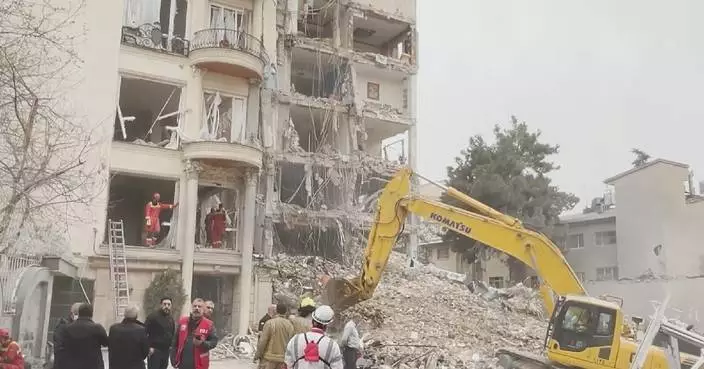 U.S.-Israeli strikes level residential building in northern Tehran