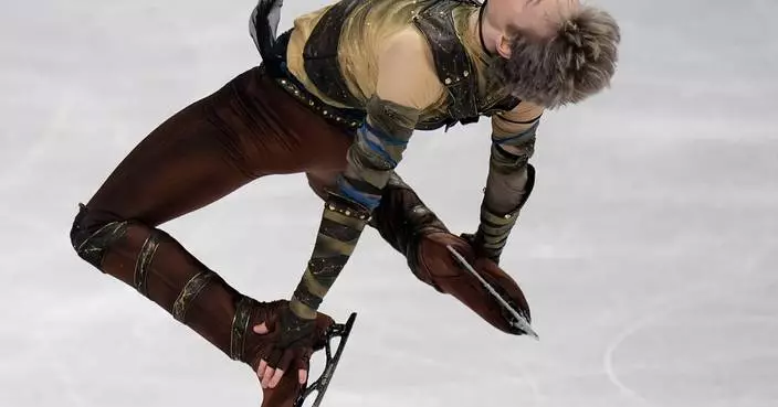 Malinin rebounds from Olympics at the worlds with a personal-best short program