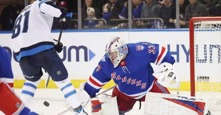 Jets beat the Rangers in a shootout to spoil goalie Dylan Garand's NHL debut