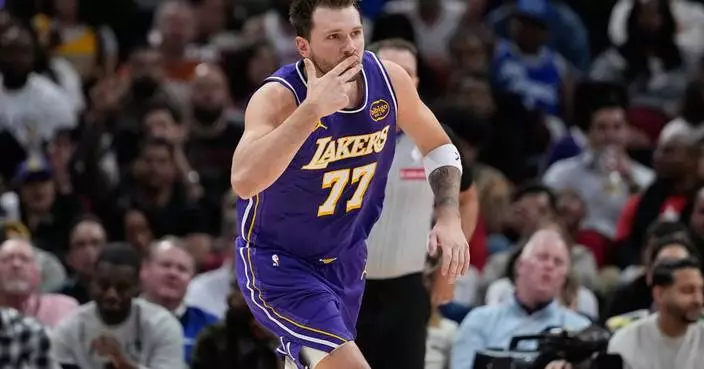 Doncic drops 40, James adds 30 as Lakers stretch their streak to 7 with 124-116 win over Rockets