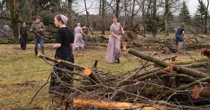 Photos show damage left by powerful storms as volunteers help communities clean up