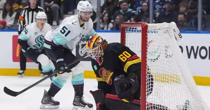 Bobby McMann has 2 goals and an assist in his visa-delayed Kraken debut against Canucks