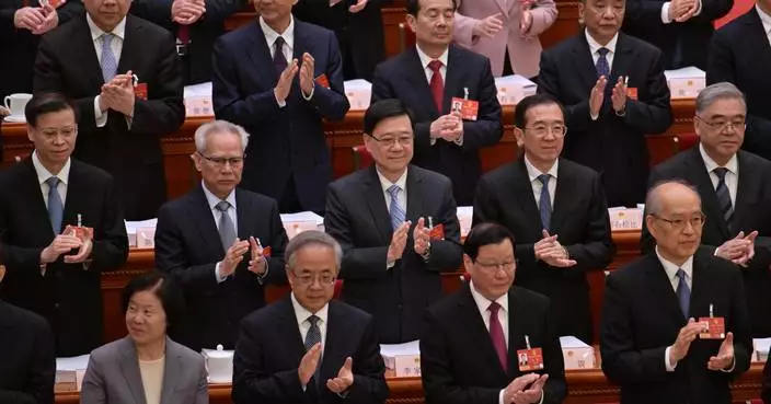 John Lee Attends Opening of 14th National People's Congress Session in Beijing