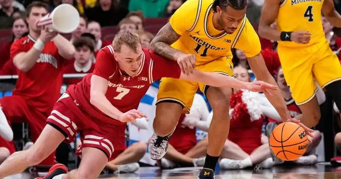 Lendeborg makes a tiebreaking 3 as No. 3 Michigan tops No. 23 Wisconsin 68-65 in Big Ten semis
