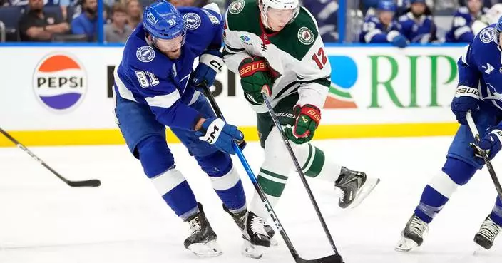 Cernak scores on crazy carom late in 3rd period as the Wild beat the Lightning 6-3