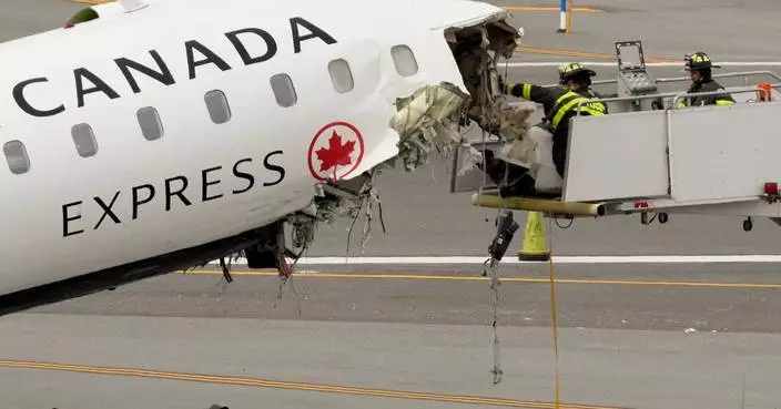 LaGuardia Airport runway where plane collided with fire truck, killing 2, reopens