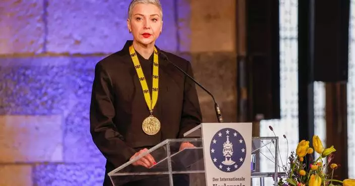 Prominent Belarus opposition figure picks up prize she was awarded while in prison