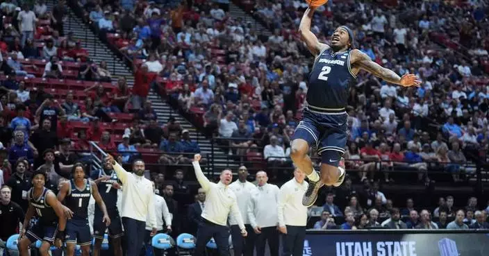 Collins scores 20 points to lead Utah State over Villanova 86-76 in March Madness